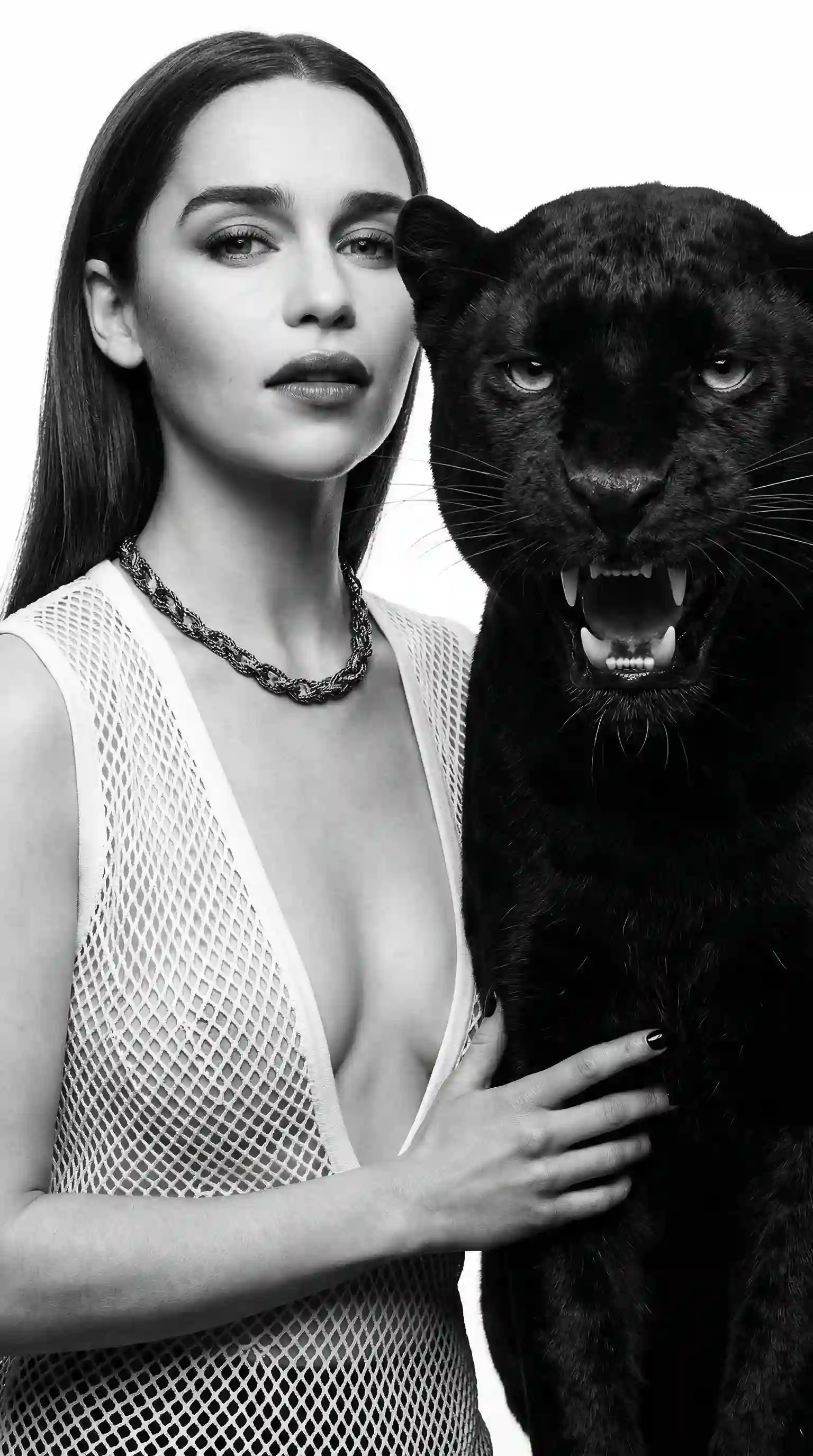 trend prompt: {
  "prompt": "Photorealistic high-fashion editorial portrait in strict black-and-white monochrome, high contrast, 8K resolution, ultra-detailed textures. Close-up composition: a majestic panther growling, expressive pose stands powerfully, next to it a young woman with long straight hair and flawless makeup stands close beside and gently touches the panther. She wears a white fishnet sleeveless deep V-neck shirt. Pure white minimalist background. Dramatic studio lighting with strong backlighting creating elegant rim light silhouettes on hair and fur, deep shadows, sharp focus, hyper-realistic fur and fabric detail. Vogue-style editorial photography, gothic chic aesthetic, surreal atmosphere, high-fashion mood, no color.",
  "negative_prompt": "color, blurry, low resolution, deformed anatomy, extra limbs, mutated hands, poorly drawn face, bad proportions, watermark, text, logo, ugly, cartoon, anime, illustration, 3D render, plastic skin, overexposed, underexposed, child, elderly, additional people, aggressive dog expression, teeth baring, open mouth snarling, bright daylight, dull lighting, smiling too wide, cluttered background",
  "parameters": {
    "aspect_ratio": "3:4",
    "style": "photorealistic high-contrast black and white editorial portrait",
    "quality": "ultra detailed, 8k, razor sharp, high dynamic range",
    "lighting": "dramatic studio lighting with strong backlighting and rim light on hair and fur, deep shadows",
    "camera_angle": "close-up, slightly low angle for majestic presence",
    "mood": "confident, gothic chic, surreal high-fashion elegance"
  }
}